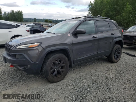 2017 Jeep Cherokee Trailhawk z VIN 1C4PJMBS0HW577055, wystawiony jako Copart lot #56428235 z przebiegiem 137 296 mil mil oraz Szkoda całkowita • Salvage title. Historia ofert i sprzedaży dostępna na DreamBid. Obrazek 1.