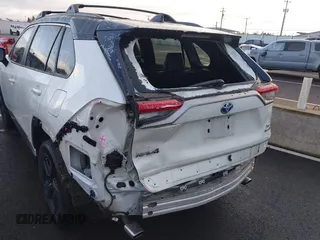 2021 Toyota RAV4 Hybrid XSE with VIN 4T3E6RFV8MU056524, listed as a IAAI auction lot 41788452 with 56,751 mi miles. Bid and sale history available at carsss.com. Image 6.