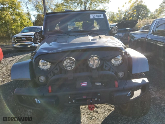 2018 Jeep Wrangler JK Unlimited Rubicon Recon with VIN 1C4HJWFG5JL803636, listed as a Copart auction lot 76370924 with 77,943 mi miles and Salvage Title. Bid and sale history available at carsss.com. Image 5.