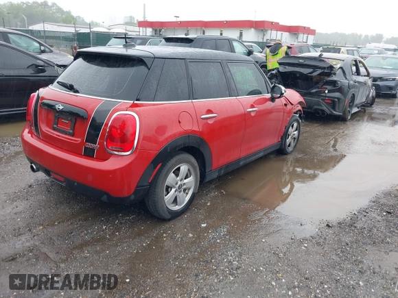 2017 MINI Hardtop 4 Door Cooper with VIN WMWXU1C58H2E18094, listed as a IAAI auction lot 42312473 with 50,482 mi miles and . Bid and sale history available at DreamBid. Image 4.