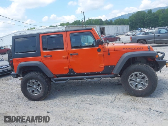 2015 Jeep Wrangler Unlimited Rubicon z VIN 1C4BJWFG4FL598033, wystawiony jako IAAI lot #42435523 z przebiegiem 134 202 mil mil oraz . Historia ofert i sprzedaży dostępna na DreamBid. Obrazek 13.