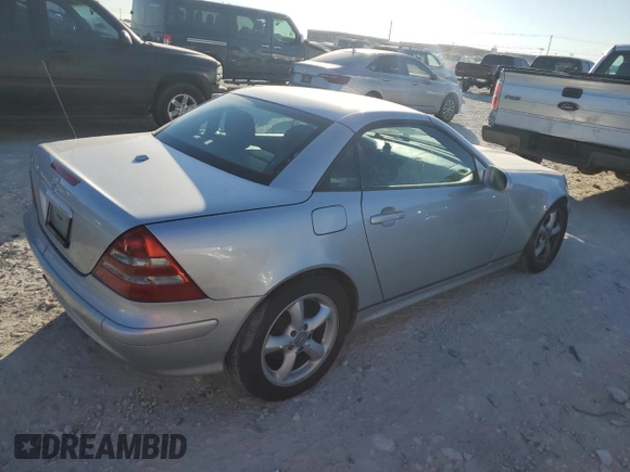 2004 Mercedes-Benz SLK-Class with VIN WDBKK65FX4F300214, listed as a Copart auction lot 82160974 with 75,964 mi miles and Salvage Title. Bid and sale history available at carsss.com. Image 3.