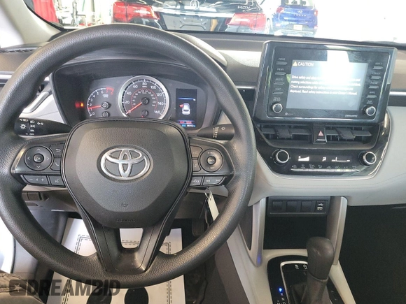 2022 Toyota Corolla Cross L with VIN 7MUAAABG3NV017192, listed as a IAAI auction lot 42841647 with 88,390 mi miles and . Bid and sale history available at DreamBid. Image 4.