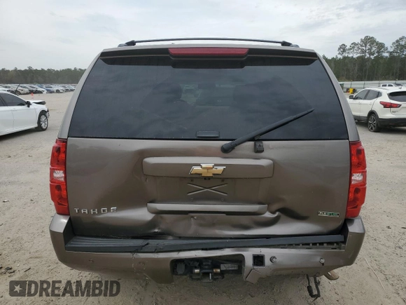2011 Chevrolet Tahoe LS with VIN 1GNSCAE09BR138852, listed as a Copart auction lot 49165595 with 207,548 mi miles and Salvage title. Bid and sale history available at DreamBid. Image 6.