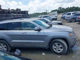 2016 Jeep Grand Cherokee 75th Anniversary with VIN 1C4RJEAG4GC391059, listed as a IAAI auction lot 42485892 with 160,000 mi miles and . Bid and sale history available at DreamBid. Image 13.