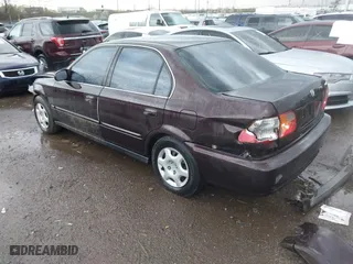2000 Honda Civic EX with VIN 1HGEJ8644YL037589, listed as a IAAI auction lot 41891907 with 127,086 mi miles. Bid and sale history available at carsss.com. Image 3.
