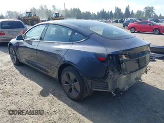2023 Tesla Model 3 z VIN 5YJ3E1EA5PF656325, wystawiony jako IAAI lot #42465795 z przebiegiem 30 256 mil mil oraz . Historia ofert i sprzedaży dostępna na DreamBid. Obrazek 3.