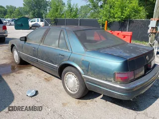 1992 Cadillac Seville z VIN 1G6KS53B4NU818363, wystawiony jako IAAI lot #42357836 z przebiegiem 91 439 mil mil oraz . Historia ofert i sprzedaży dostępna na DreamBid. Obrazek 3.
