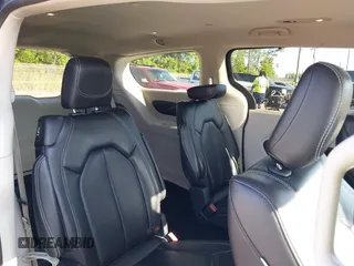2023 Chrysler Pacifica Touring L with VIN 2C4RC1BG1PR606566, listed as a IAAI auction lot 42615498 with 42,980 mi miles and . Bid and sale history available at DreamBid. Image 8.