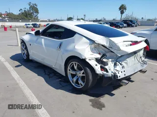 2009 Nissan 370Z Touring with VIN JN1AZ44E99M411252, listed as a IAAI auction lot 41969671 with 91,873 mi miles and . Bid and sale history available at DreamBid. Image 3.