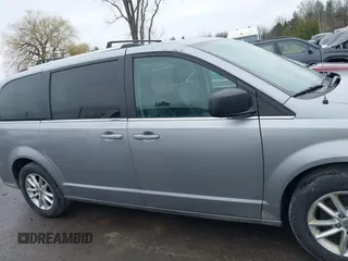 2019 Dodge Grand Caravan SXT with VIN 2C4RDGCG1KR580039, listed as a IAAI auction lot 41997472 with 163,915 mi miles and . Bid and sale history available at DreamBid. Image 14.