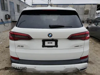 2020 BMW X5 xDrive40i z VIN 5UXCR6C02L9C46986, wystawiony jako Copart lot #59624005 z przebiegiem Nie podano mil oraz Szkoda całkowita • Salvage title. Historia ofert i sprzedaży dostępna na DreamBid. Obrazek 6.