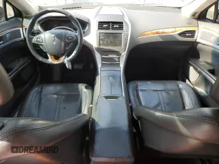 2013 Lincoln MKZ z VIN 3LN6L2GK5DR823755, wystawiony jako Copart lot #53060295 z przebiegiem 145 624 mil mil oraz Szkoda całkowita • Salvage title. Historia ofert i sprzedaży dostępna na DreamBid. Obrazek 8.