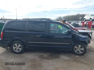 2010 Dodge Grand Caravan SXT with VIN 2D4RN5D13AR427353, listed as a IAAI auction lot 42180594 with 191,535 mi miles and . Bid and sale history available at DreamBid. Image 13.