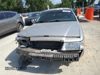2003 Mercury Grand Marquis LS Premium with VIN 2MEHM75W63X697725, listed as a Copart auction lot 54485505 with 129,194 mi miles and Salvage Title. Bid and sale history available at DreamBid. Image 5.