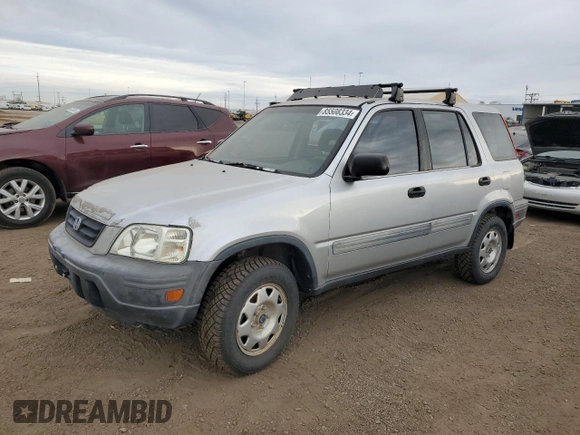 2000 Honda CR-V LX with VIN JHLRD1740YC054163, listed as a Copart auction lot 85508334 with 197,470 mi miles and Salvage Title. Bid and sale history available at carsss.com. Image 1.