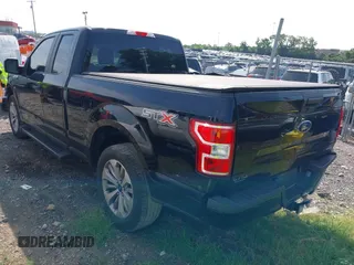 2018 Ford F-150 XL with VIN 1FTEX1CPXJKE63642, listed as a IAAI auction lot 42768090 with 147,219 mi miles and . Bid and sale history available at DreamBid. Image 3.