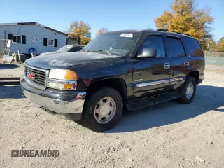 2004 GMC Yukon SLE with VIN 1GKEK13V24J236327, listed as a Copart auction lot 76896974 with 151,028 mi miles and Salvage Title. Bid and sale history available at carsss.com. Image 1.