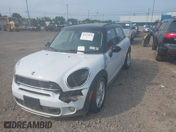 2015 MINI Countryman S with VIN WMWZC5C59FWM18935, listed as a IAAI auction lot 42427878 with 121,410 mi miles and . Bid and sale history available at DreamBid. Image 17.