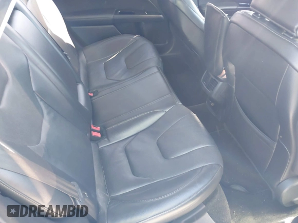 2016 Ford Fusion Titanium with VIN 3FA6P0K90GR179528, listed as a IAAI auction lot 41587248 with 230,264 mi miles and . Bid and sale history available at DreamBid. Image 8.