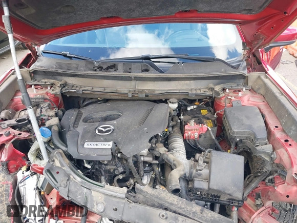 2020 Mazda CX-9 Grand Touring with VIN JM3TCBDY4L0423563, listed as a IAAI auction lot 41829394 with 76,704 mi miles and . Bid and sale history available at DreamBid. Image 10.