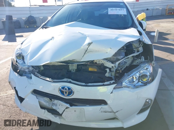 2014 Toyota Prius One with VIN JTDKDTB38E1575308, listed as a IAAI auction lot 40787857 with 70,891 mi miles and . Bid and sale history available at DreamBid. Image 6.