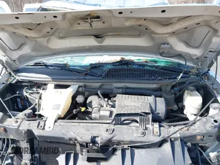 2014 Chevrolet Express Passenger LT z VIN 1GAZG1FG4E1123310, wystawiony jako IAAI lot #41775930 z przebiegiem 199 807 mil mil oraz . Historia ofert i sprzedaży dostępna na DreamBid. Obrazek 10.