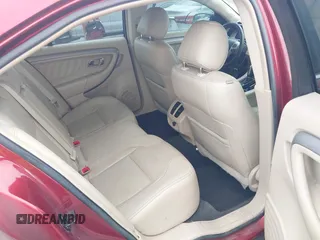 2015 Ford Taurus SEL with VIN 1FAHP2E8XFG137526, listed as a IAAI auction lot 41909658 with 147,992 mi miles and . Bid and sale history available at carsss.com. Image 8.