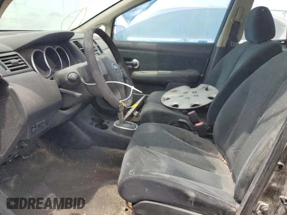 2010 Nissan Versa S with VIN 3N1BC1AP0AL409740, listed as a Copart auction lot 48996685 with 136,924 mi miles and Salvage Title. Bid and sale history available at DreamBid. Image 7.