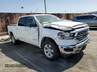 2020 Ram 1500 Laramie with VIN 1C6SRFJM6LN208434, listed as a Copart auction lot 58059085 with 64,786 mi miles and Salvage title. Bid and sale history available at DreamBid. Image 4.