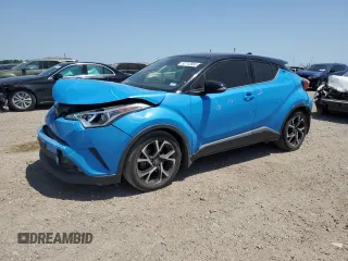 2019 Toyota C-HR XLE z VIN JTNKHMBX8K1044226, wystawiony jako Copart lot #52712855 z przebiegiem 98 490 mil mil oraz Szkoda całkowita • Salvage title. Historia ofert i sprzedaży dostępna na DreamBid. Obrazek 1.