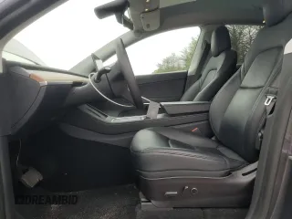 2021 Tesla Model Y Long Range z VIN 5YJYGDEE2MF204414, wystawiony jako Copart lot #59010585 z przebiegiem 56 371 mil mil oraz Szkoda całkowita • Salvage title. Historia ofert i sprzedaży dostępna na DreamBid. Obrazek 7.