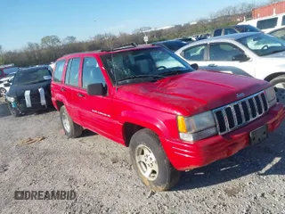 1998 Jeep Grand Cherokee Laredo with VIN 1J4GZ48Y6WC290798, listed as a IAAI auction lot 41816161 with 299,875 mi miles. Bid and sale history available at carsss.com. Image 1.