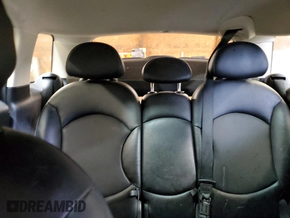 2014 MINI Countryman with VIN WMWZB3C59EWR42124, listed as a Copart auction lot 57830395 with 125,000 mi miles and Salvage title. Bid and sale history available at DreamBid. Image 10.