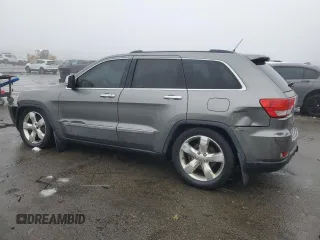 2013 Jeep Grand Cherokee Overland with VIN 1C4RJFCTXDC555233, listed as a Copart auction lot 44535045 with 104,721 mi miles and Clean Title. Bid and sale history available at carsss.com. Image 2.