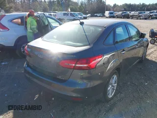 2015 Ford Focus SE with VIN 1FADP3F26FL280298, listed as a IAAI auction lot 40852000 with 144,805 mi miles and . Bid and sale history available at DreamBid. Image 4.