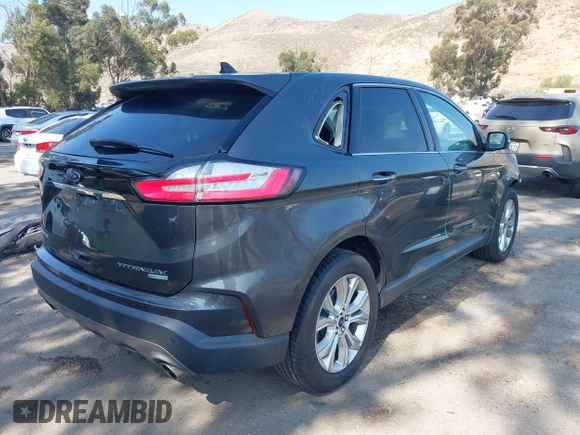 2020 Ford Edge Titanium with VIN 2FMPK3K94LBB10568, listed as a IAAI auction lot 42430196 with 76,490 mi miles and . Bid and sale history available at DreamBid. Image 4.