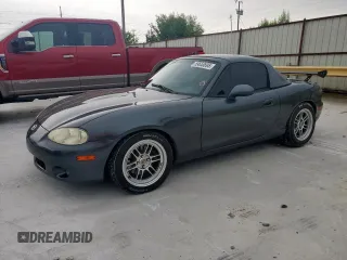 2001 Mazda MX-5 Miata with VIN JM1NB353210210976, listed as a Copart auction lot 59653695 with 152,250 mi miles and Salvage title. Bid and sale history available at DreamBid. Image 1.
