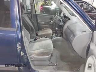 2003 Chevrolet Tracker ZR2 z VIN 2CNBJ734736905310, wystawiony jako IAAI lot #41519431 z przebiegiem 177 643 mil mil oraz . Historia ofert i sprzedaży dostępna na DreamBid. Obrazek 5.