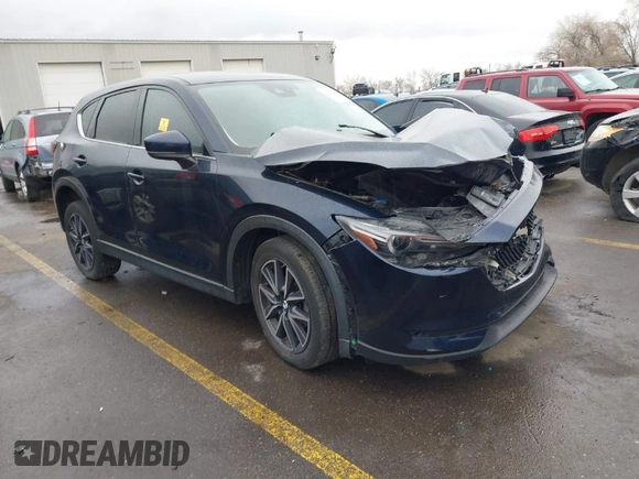 2018 Mazda CX-5 Grand Touring with VIN JM3KFBDM8J0345821, listed as a IAAI auction lot 41789284 with 1 mi miles. Bid and sale history available at carsss.com. Image 1.