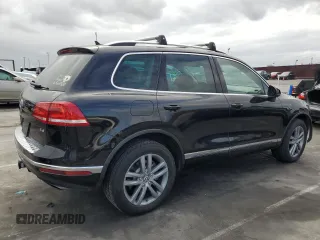 2016 Volkswagen Touareg Sport с VIN WVGEF9BP3GD011138, выставлен на аукционе Copart как лот 53557195 с пробегом 75 825 миль миль и Списание • Salvage title. История ставок и продаж доступна на DreamBid. Изображение 3.