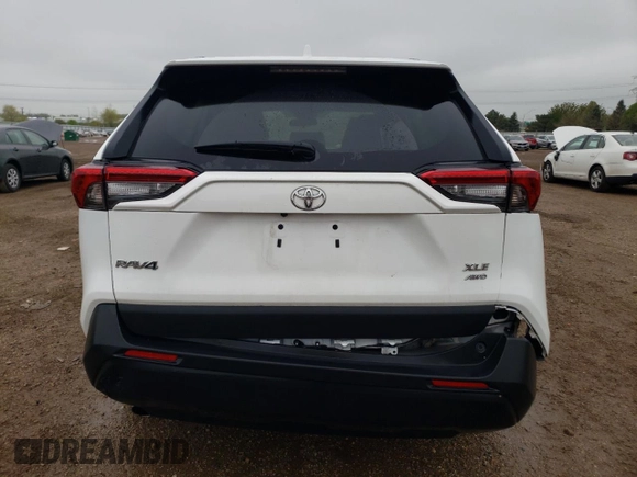 2021 Toyota RAV4 XLE with VIN 2T3P1RFV6MW228427, listed as a Copart auction lot 55323325 with 54,002 mi miles and Salvage title. Bid and sale history available at DreamBid. Image 6.