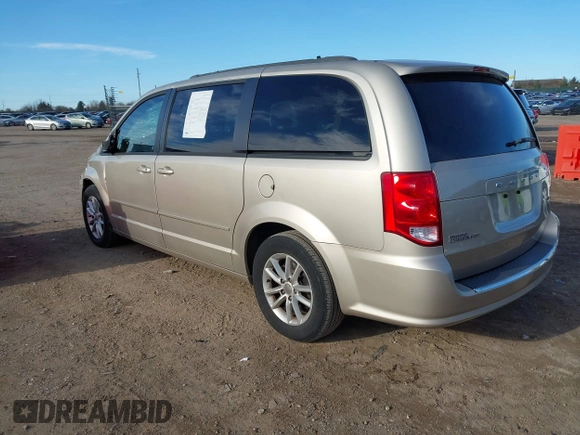 2014 Dodge Grand Caravan SXT with VIN 2C4RDGCG0ER210186, listed as a IAAI auction lot 40813319 with 100,230 mi miles and . Bid and sale history available at DreamBid. Image 3.