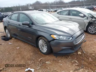 2015 Ford Fusion S Hybrid with VIN 3FA6P0UU7FR167229, listed as a IAAI auction lot 41684934 with 135,317 mi miles. Bid and sale history available at carsss.com. Image 1.
