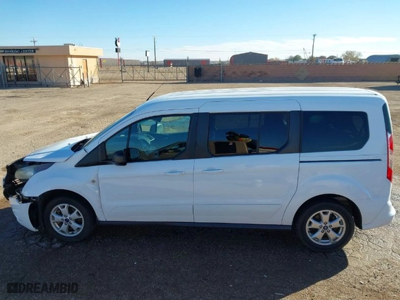 2015 Ford Transit Connect Wagon XLT with VIN NM0GE9F78F1182619, listed as a IAAI auction lot 41020765 with 137,279 mi miles. Bid and sale history available at carsss.com. Image 14.