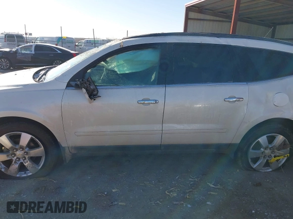 2012 Chevrolet Traverse 1LT with VIN 1GNKRGED4CJ323797, listed as a IAAI auction lot 41267339 with 142,463 mi miles and . Bid and sale history available at DreamBid. Image 13.