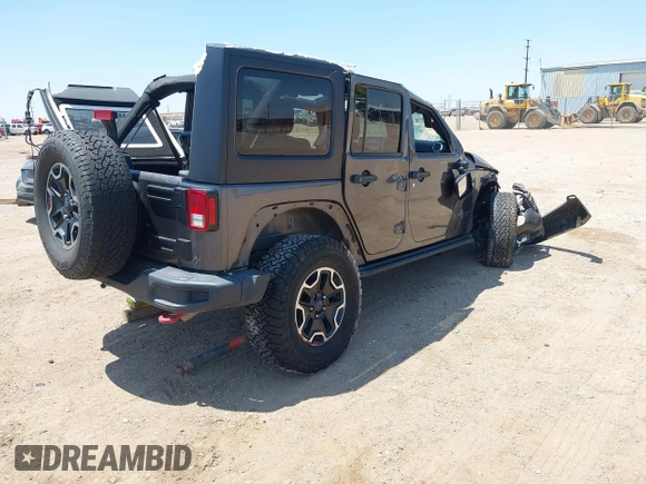 2016 Jeep Wrangler Unlimited Rubicon with VIN 1C4BJWFG7GL274673, listed as a IAAI auction lot 42532134 with 166,661 mi miles and . Bid and sale history available at DreamBid. Image 4.
