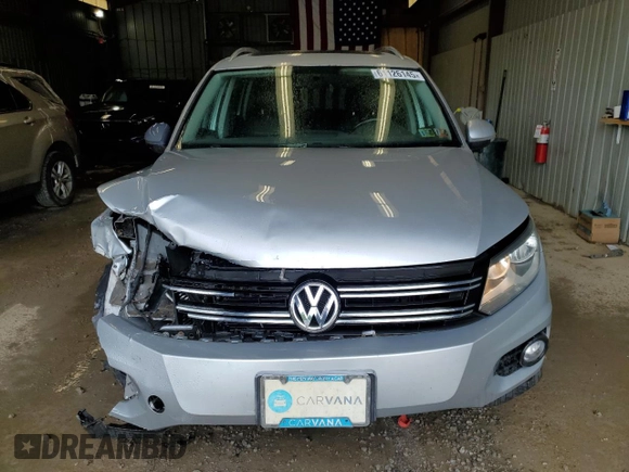 2013 Volkswagen Tiguan SE with VIN WVGBV7AX1DW504036, listed as a Copart auction lot 61126145 with 148,399 mi miles and Salvage title. Bid and sale history available at DreamBid. Image 5.