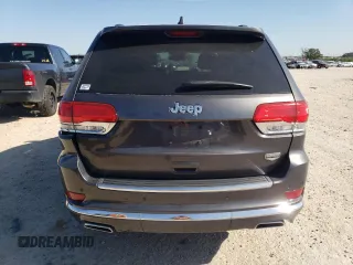 2014 Jeep Grand Cherokee Summit with VIN 1C4RJEJGXEC192532, listed as a Copart auction lot 86210124 with 72,401 mi miles and Salvage title. Bid and sale history available at DreamBid. Image 6.