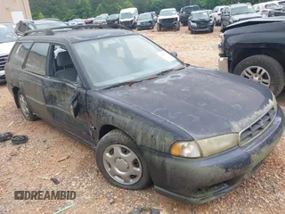 1999 Subaru Legacy L z VIN 4S3BK4354X6304781, wystawiony jako IAAI lot #40755596 z przebiegiem 28 025 mil mil oraz . Historia ofert i sprzedaży dostępna na DreamBid. Obrazek 1.